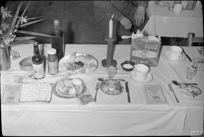 A Passover table set in wartime Britain, 1944; the Memorial follows the Passover date