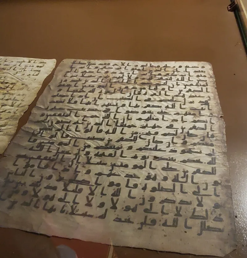 An ancient unvocalized Kufic Quran parchment from the Great Mosque of Sana'a, without case marks