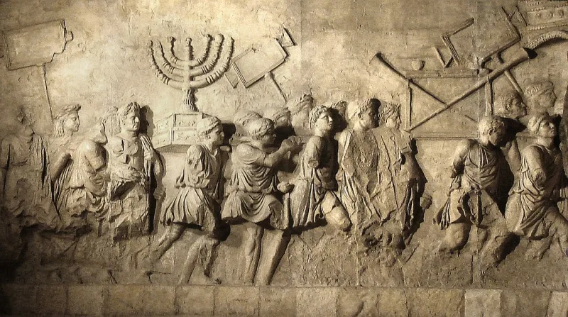 A museum copy of the Arch of Titus panel, showing the Temple menorah carried off after AD 70