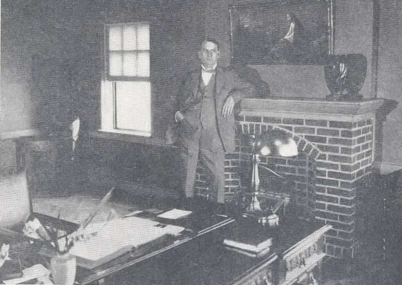 Rutherford in his office at 124 Columbia Heights, Brooklyn, the Society's headquarters building