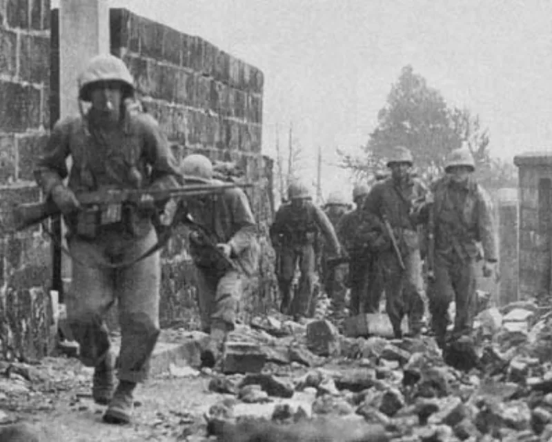A Marine patrol on Okinawa in 1945; a representative wartime image, unconnected to Dunn's invented stories