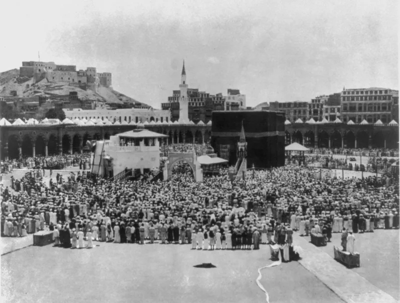 Prayer at Mecca photographed in 1889, the rite as performed long before the slogan