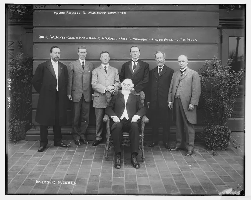 Russell, seated centre, with the men who joined his 1911 world preaching tour