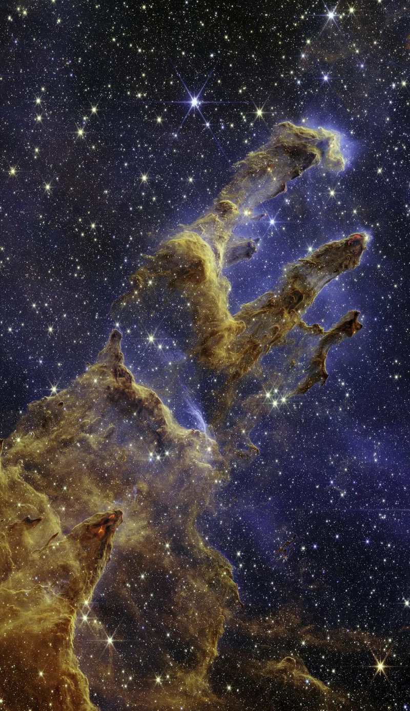 Star-forming pillars in the Eagle Nebula, imaged in infrared by the James Webb Space Telescope