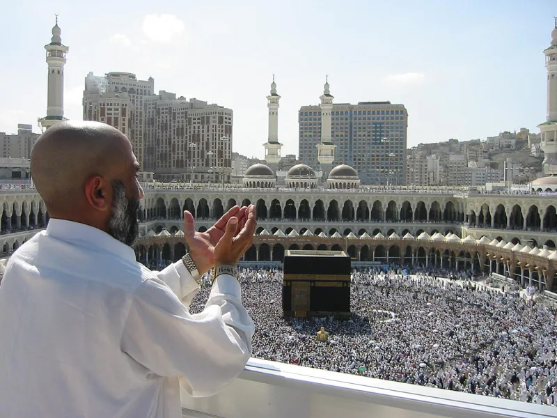 A pilgrim supplicating at the Masjid al-Haram in Mecca
